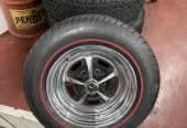 64-66 Mustang wheels and tires.